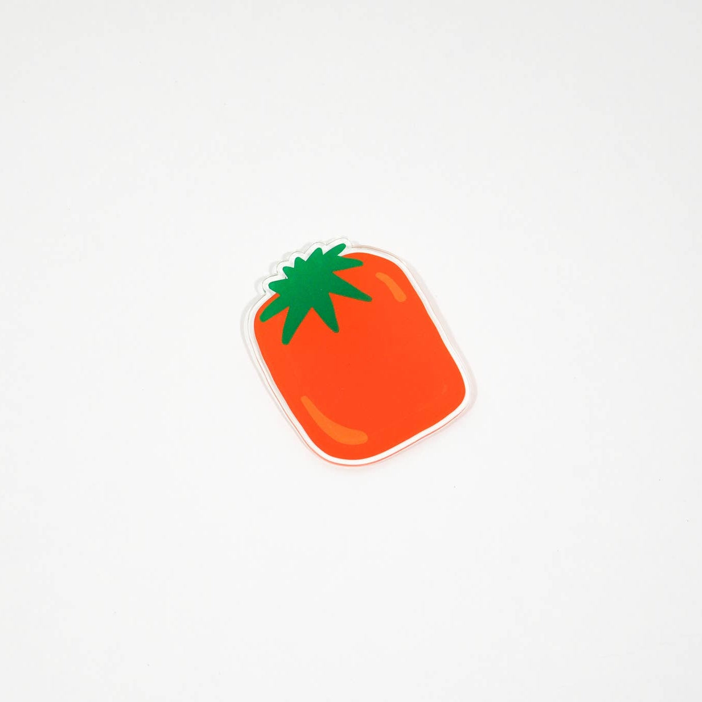 Stylized illustration of a red tomato with green leaves on a white background