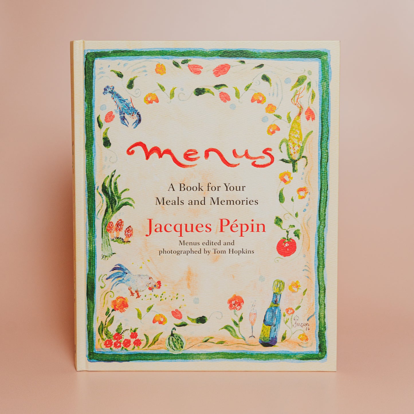 Book titled 'Menus' by Jacques Pepin on a beige background
